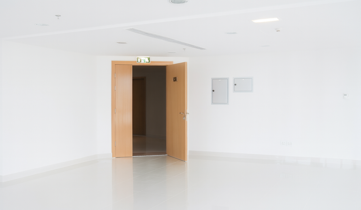 Minimalist Commercial Interior with Open Door