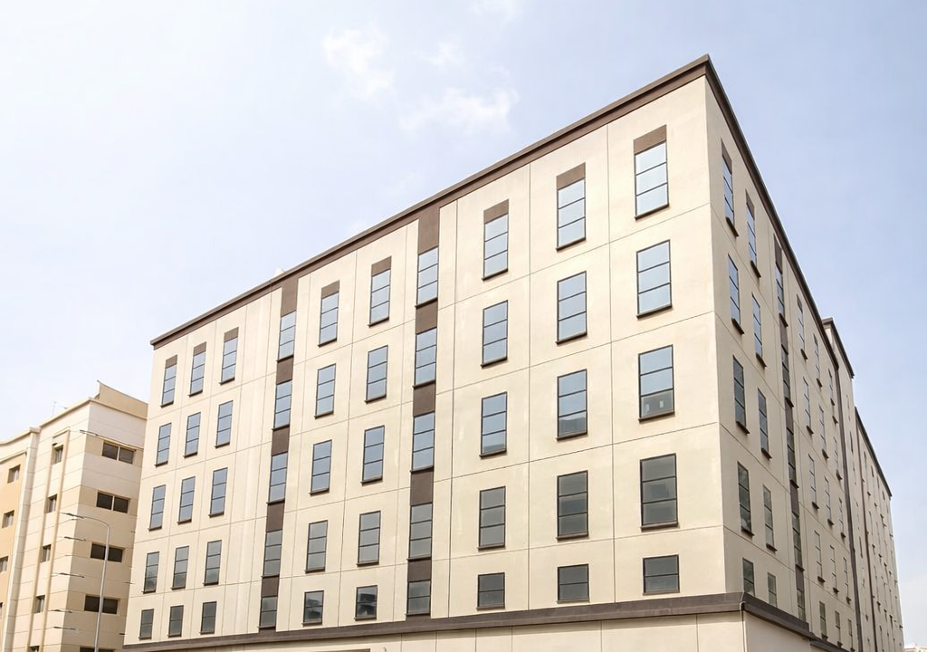 Modern urban building with road sign