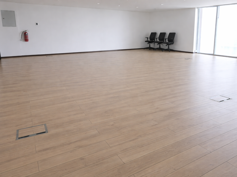 Empty office with oak flooring
