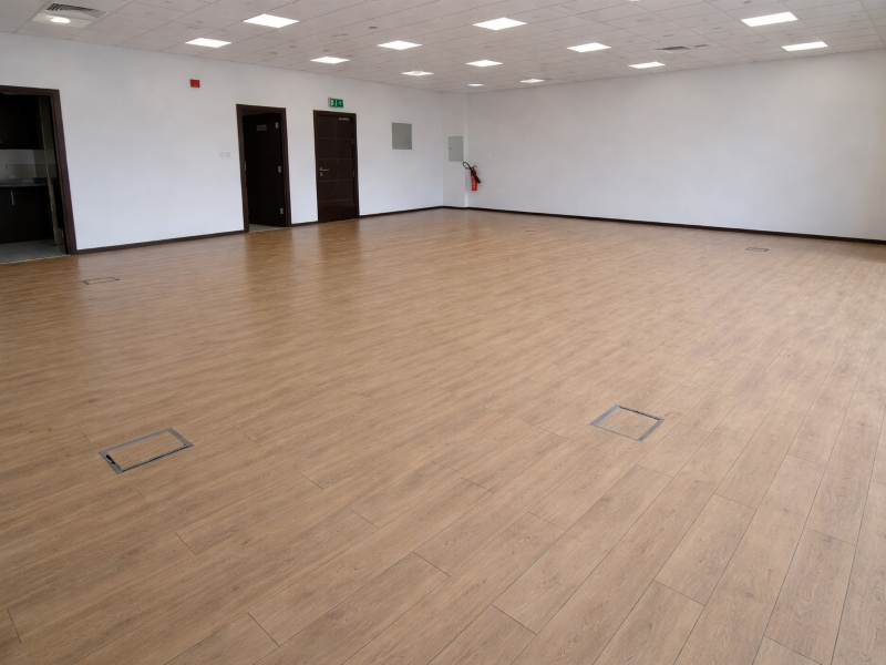 Spacious office with light oak flooring